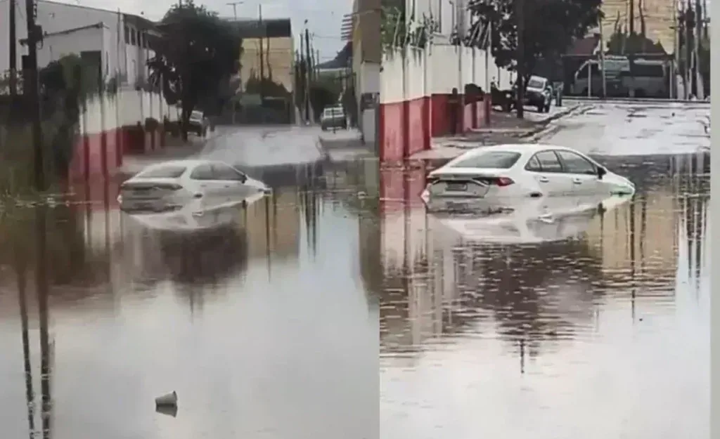 Chuva intensa alaga rua em Cuiabá e carro fica ilhado em bairro e mobiliza a com em destaque