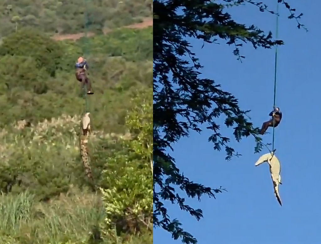 Policial é içado de helicóptero para resgatar empresário encontrado dentro de cr em destaque